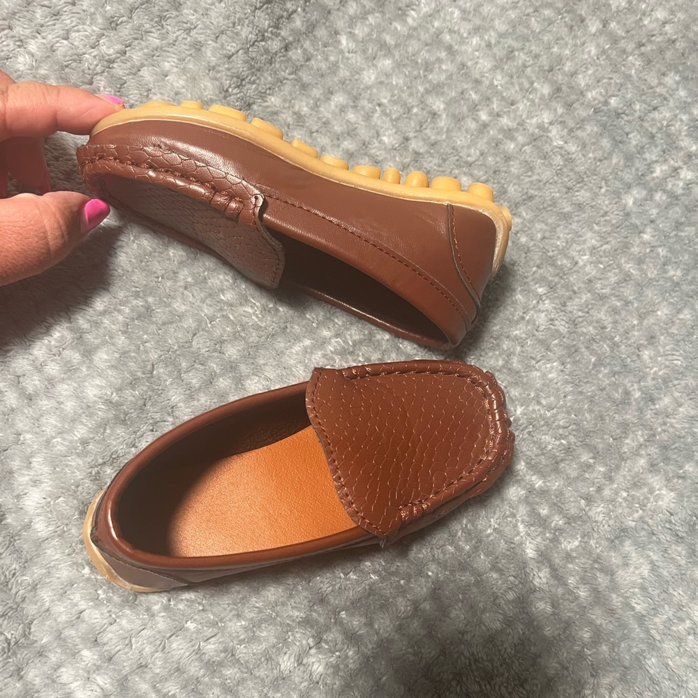 Brown loafers size 8C. Only worn once